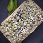 sunflower seed cake topped with various seeds